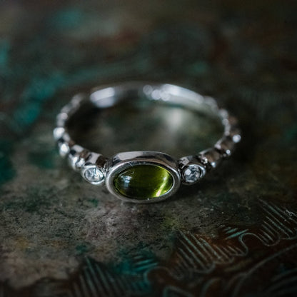 Vintage 1980s Peridot Cabochon and Clear Austrian Crystal 18k White Gold Electroplated Ring jewelry image 1