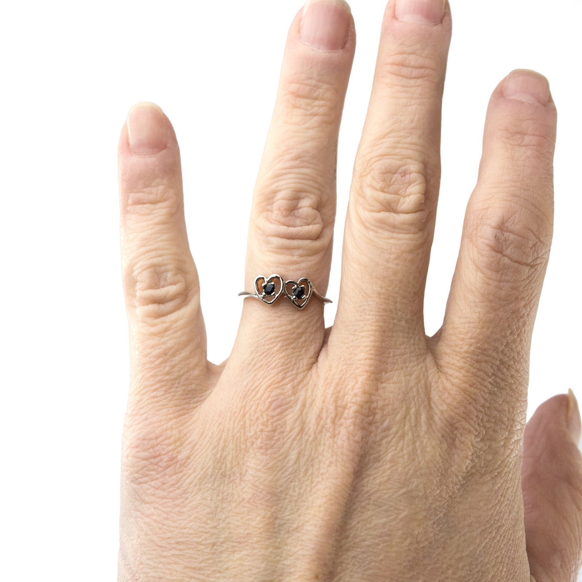 Vintage 1980s double heart ring with two round genuine sapphires in 18K white gold electroplated setting