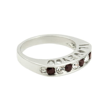 Silver tone band ring with engraved I Love You text and alternating garnet and clear Austrian crystals in channel setting