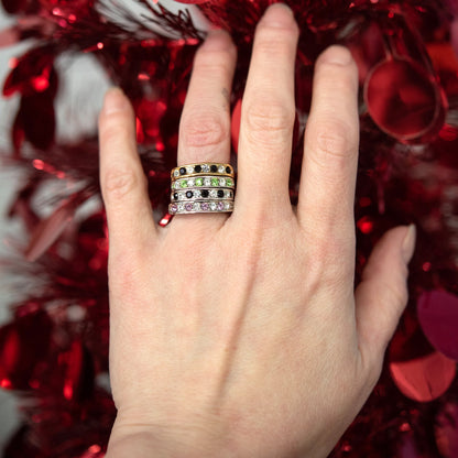 Silver tone band ring with engraved I Love You text and alternating garnet and clear Austrian crystals in channel setting