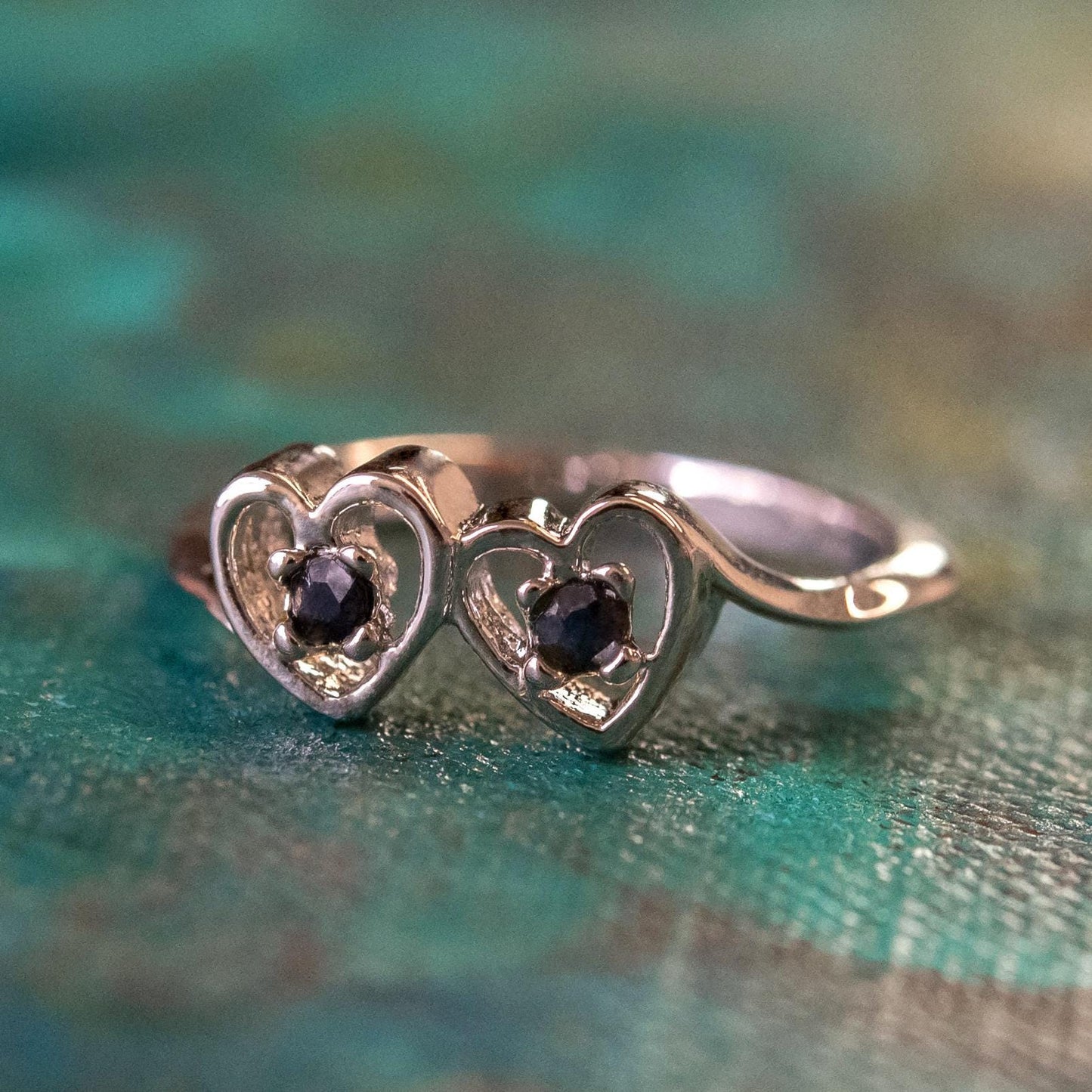 Vintage 1980s double heart ring with two round genuine sapphires in 18K white gold electroplated setting