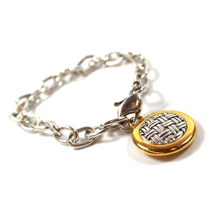 Vintage Signed Oscar De La Renta Silver Tone 7 Inch Chain Bracelet with Two Tone Round Weave Patterned Pendant