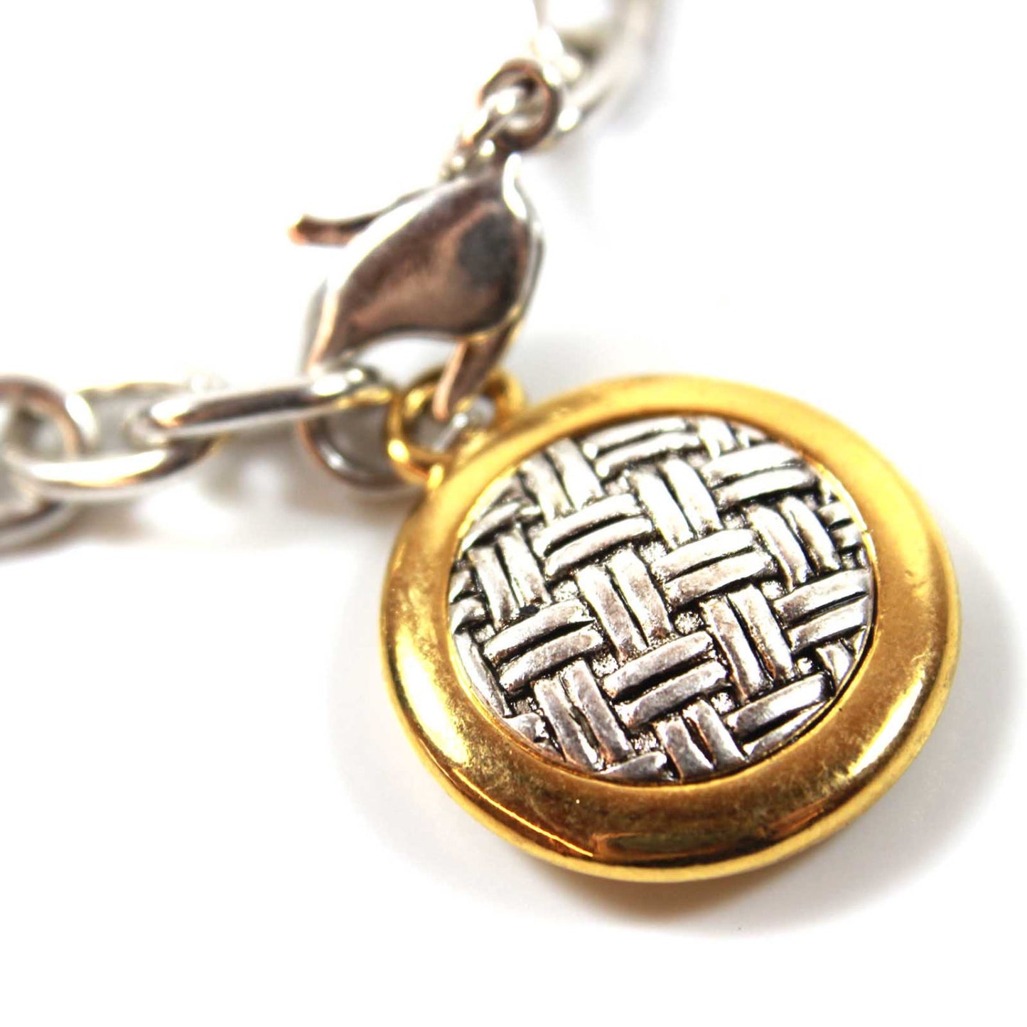 Vintage Signed Oscar De La Renta Silver Tone 7 Inch Chain Bracelet with Two Tone Round Weave Patterned Pendant