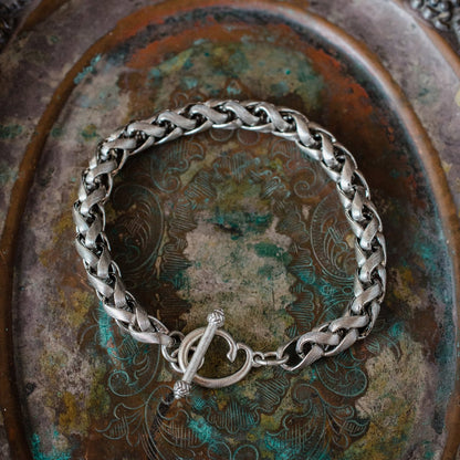 Vintage Oscar De La Renta Silver Tone Braided Textured Links Bracelet Size: