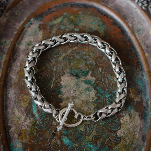 Vintage Oscar De La Renta Silver Tone Braided Textured Links Bracelet
